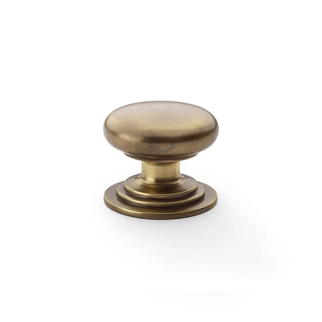 Round Brass Cupboard Knob on Stepped Rose