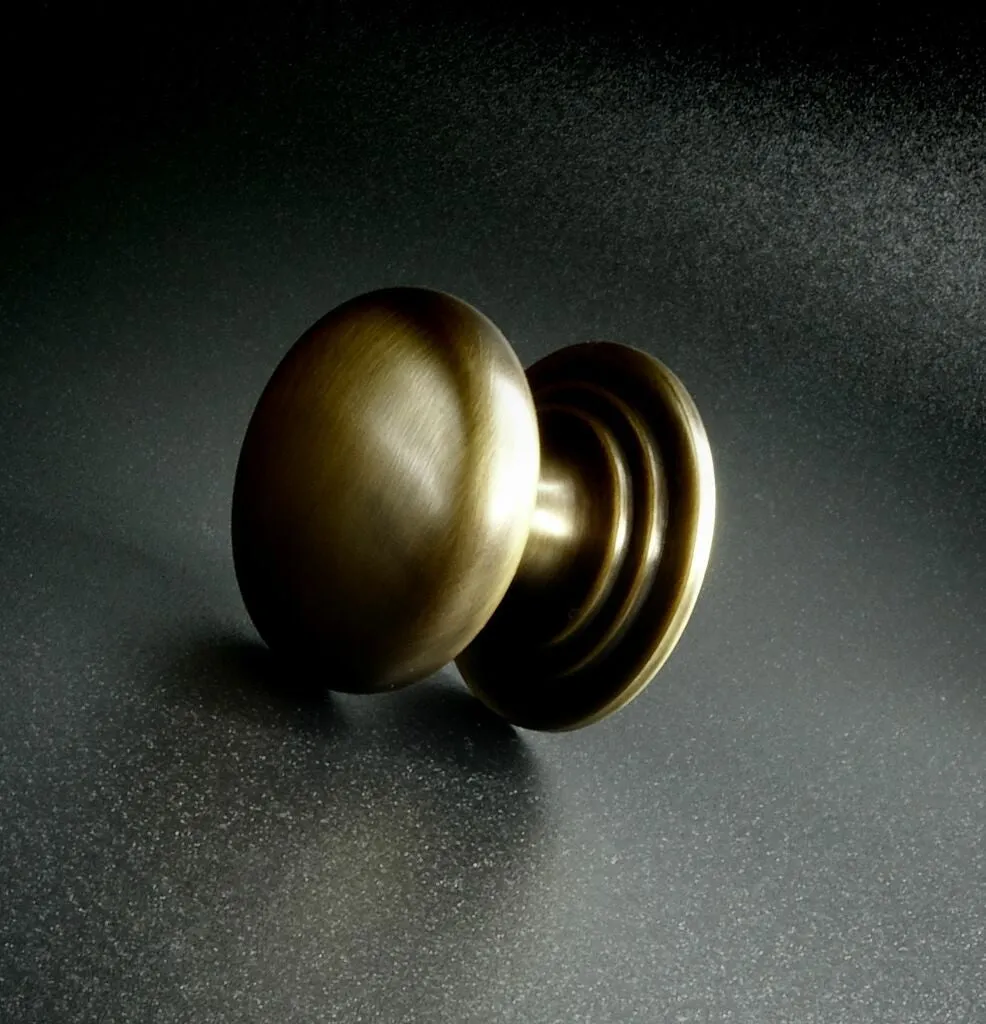 Round Brass Cupboard Knob on Stepped Rose